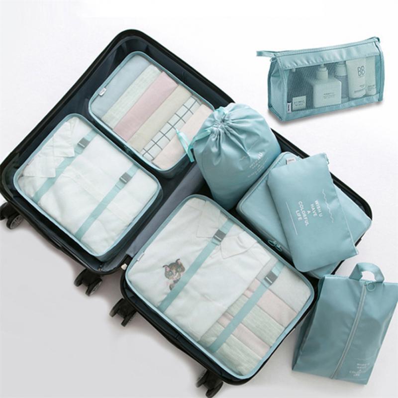 Full set laid out showing all eight pouches